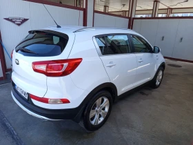 Kia Sportage 2.0i Automatic  - 10780 € / 21083.85 лв. - 17000060 3