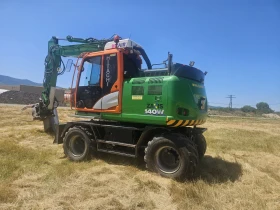 Багер Hitachi 140W, снимка 1