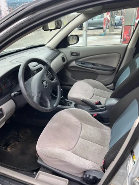 Nissan Almera 1.5i, снимка 14