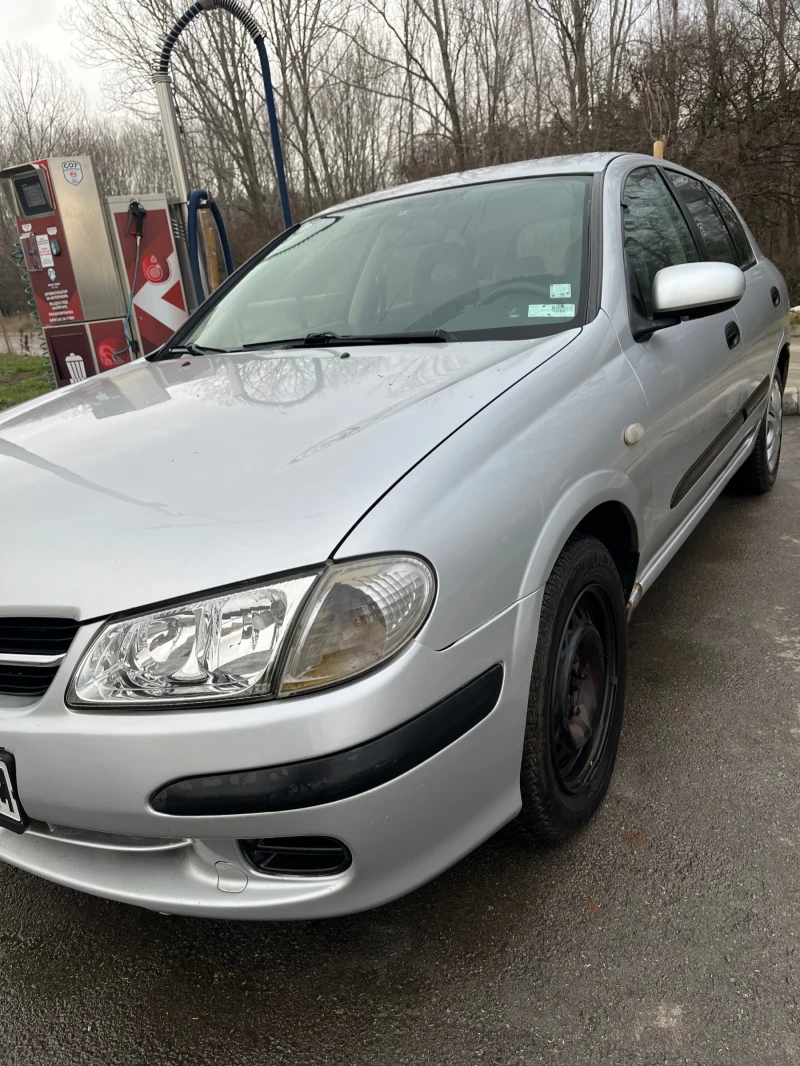 Nissan Almera 1.5i, снимка 2 - Автомобили и джипове - 48310968