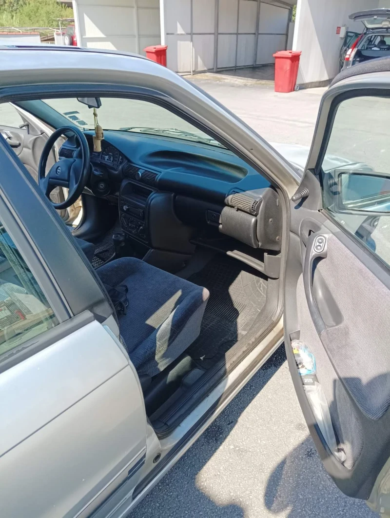 Opel Astra, снимка 7 - Автомобили и джипове - 52580194