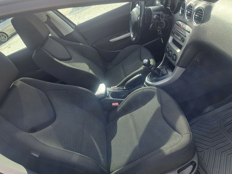 Peugeot 308 1.6 HDI ПАНОРАМА, снимка 11 - Автомобили и джипове - 53473266