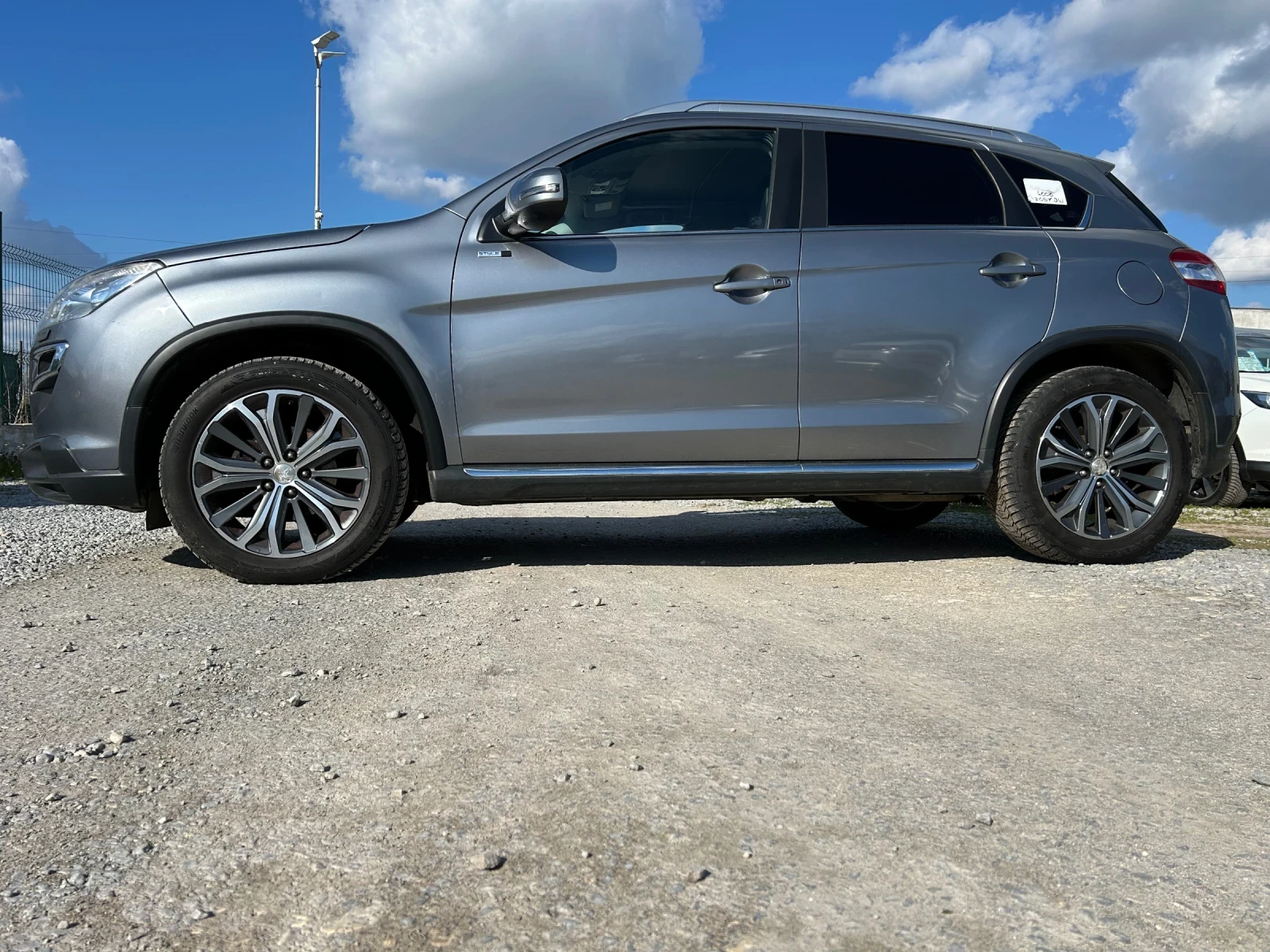 Peugeot 4008 1.6E-HDi/EURO 6/116K.C./4x4/ПАНОРАМА, снимка 4 - Автомобили и джипове - 54160079