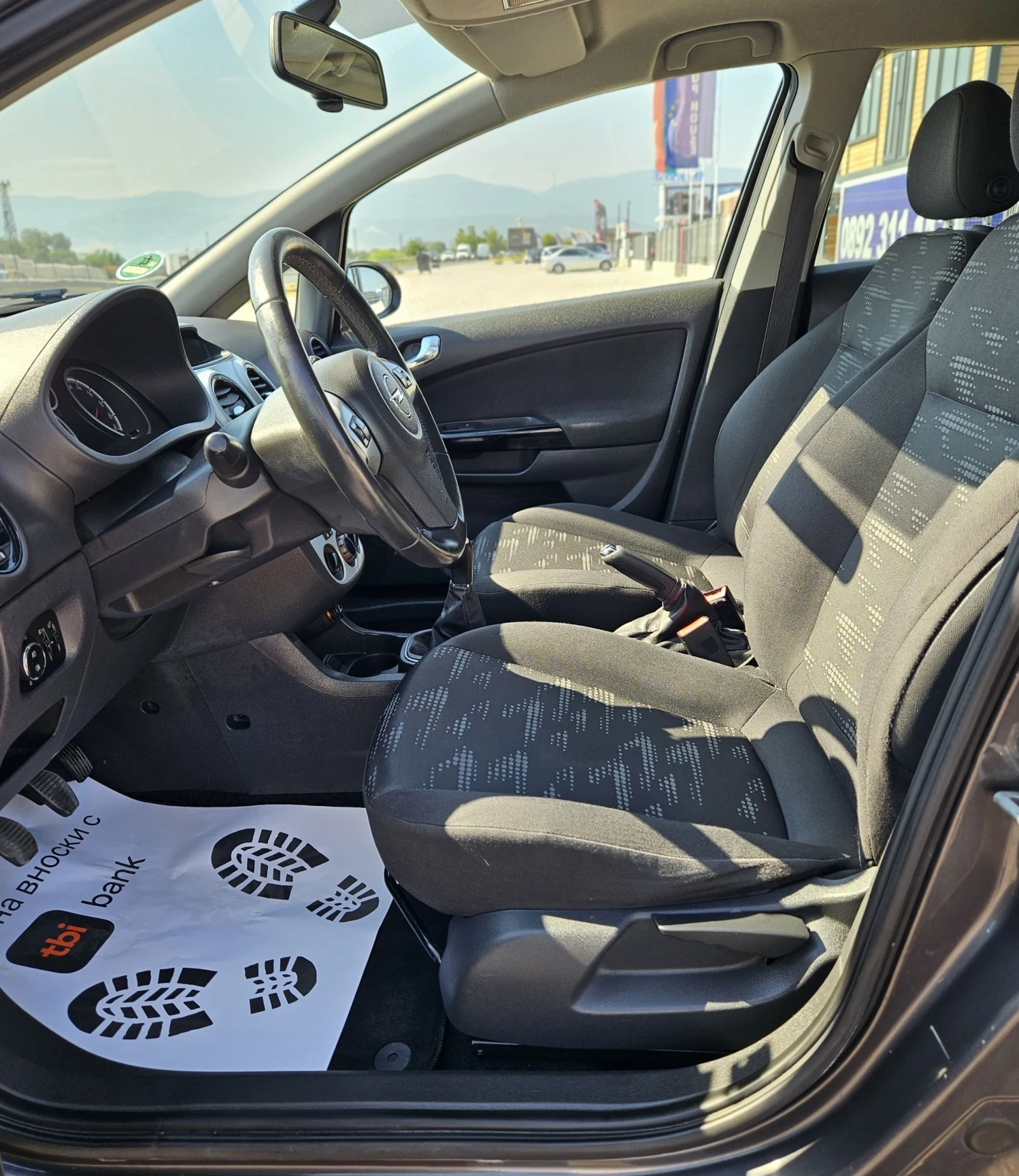 Opel Corsa Евро5, снимка 12 - Автомобили и джипове - 55449398