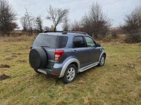 Обява за продажба на Daihatsu Terios 1.5 16V ГАЗ Android Navi Camera ~11 250 лв. - изображение 10 | Auto.bg Обява за продажба на Daihatsu Terios 1.5 16V ГАЗ Android Navi Camera ~11 250 лв. - изображение 10