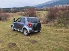 Обява за продажба на Daihatsu Terios 1.5 16V ГАЗ Android Navi Camera ~11 250 лв. - изображение 4 | Auto.bg Обява за продажба на Daihatsu Terios 1.5 16V ГАЗ Android Navi Camera ~11 250 лв. - изображение 4