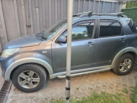 Обява за продажба на Daihatsu Terios 1.5 16V ГАЗ Android Navi Camera ~11 250 лв. - изображение 8 | Auto.bg Обява за продажба на Daihatsu Terios 1.5 16V ГАЗ Android Navi Camera ~11 250 лв. - изображение 8