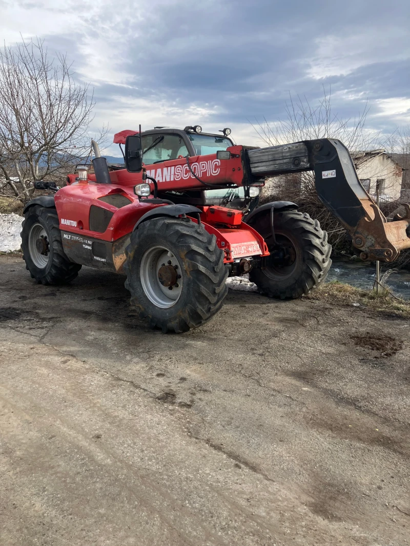 Телескопичен товарач Manitou 735