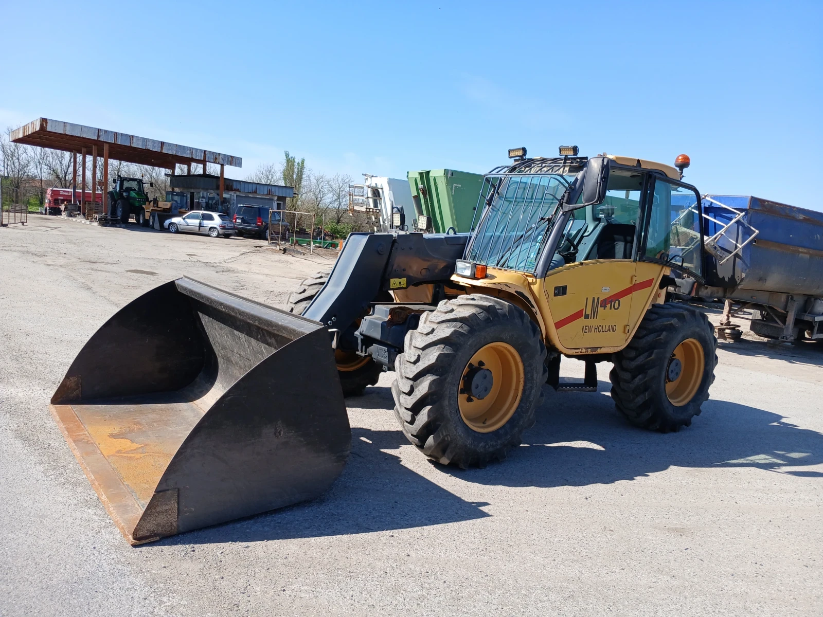 Телескопичен товарач New Holland LM410 | Mobile.bg — изображение 1