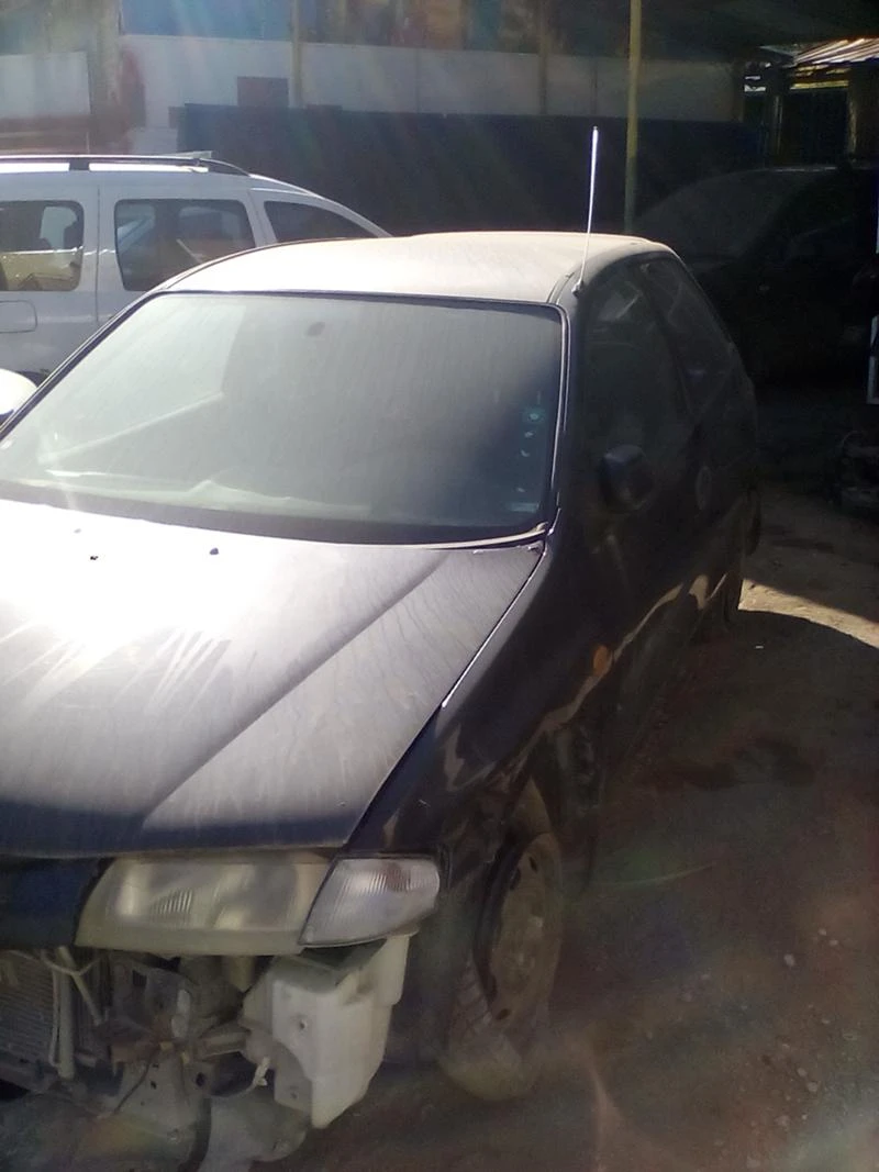 Mazda 323 1.5 I, снимка 1 - Автомобили и джипове - 26791258