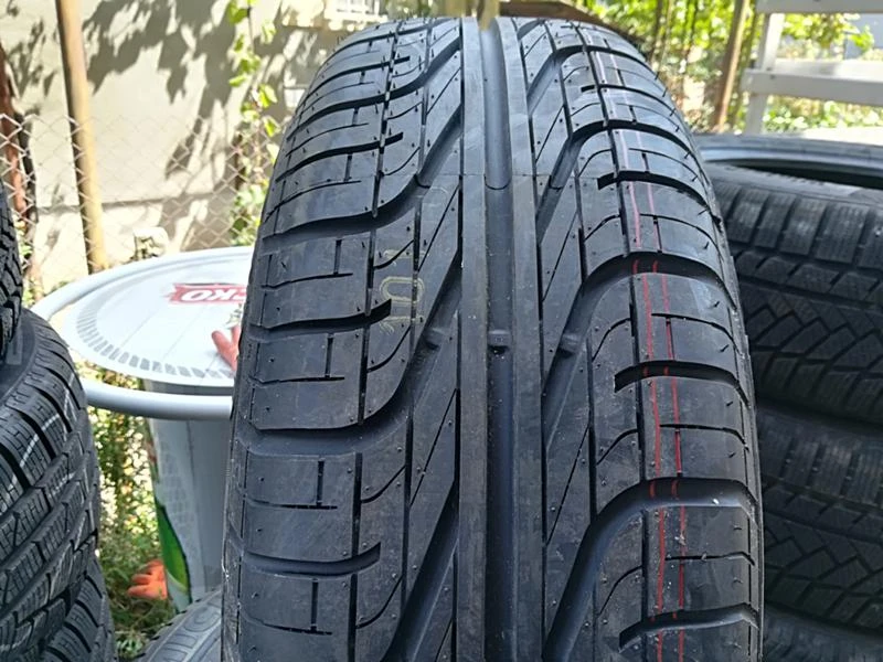 Гуми Летни 205/65R15, снимка 1 - Гуми и джанти - 22593908