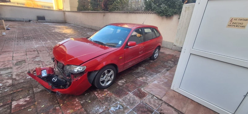 Mazda 323, снимка 1 - Автомобили и джипове - 48292365