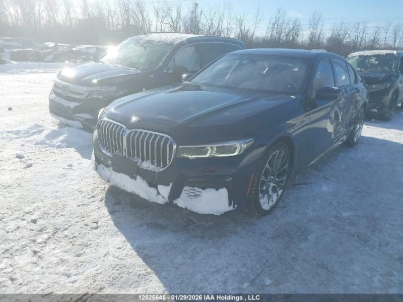 BMW 750 MPACK* AMBIENT* HEADUP* HARMAN* ВАКУМ, снимка 3 - Автомобили и джипове - 53452993