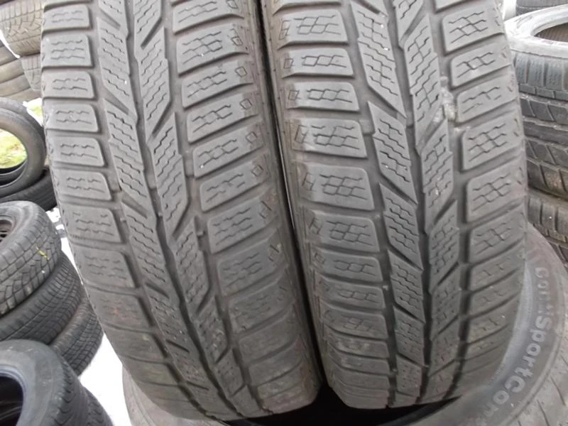 Гуми Зимни 155/65R14, снимка 1 - Гуми и джанти - 8930925