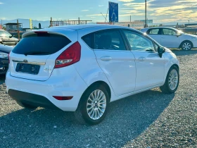 Ford Fiesta 1.4i* TiTANIUM* LPG*  - 8600 лв. / 4397.11 € - 74794832 4