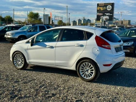 Ford Fiesta 1.4i* TiTANIUM* LPG*  - 8600 лв. / 4397.11 € - 74794832 7