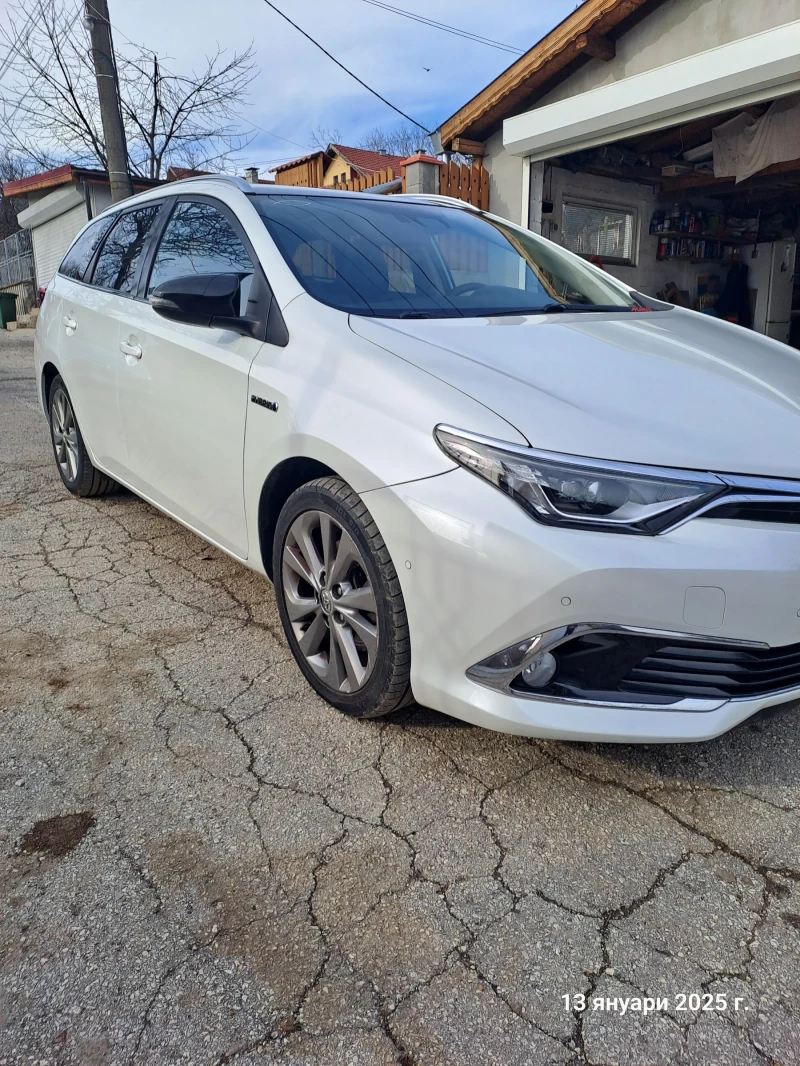 Toyota Auris Хибрид, снимка 2 - Автомобили и джипове - 48740317