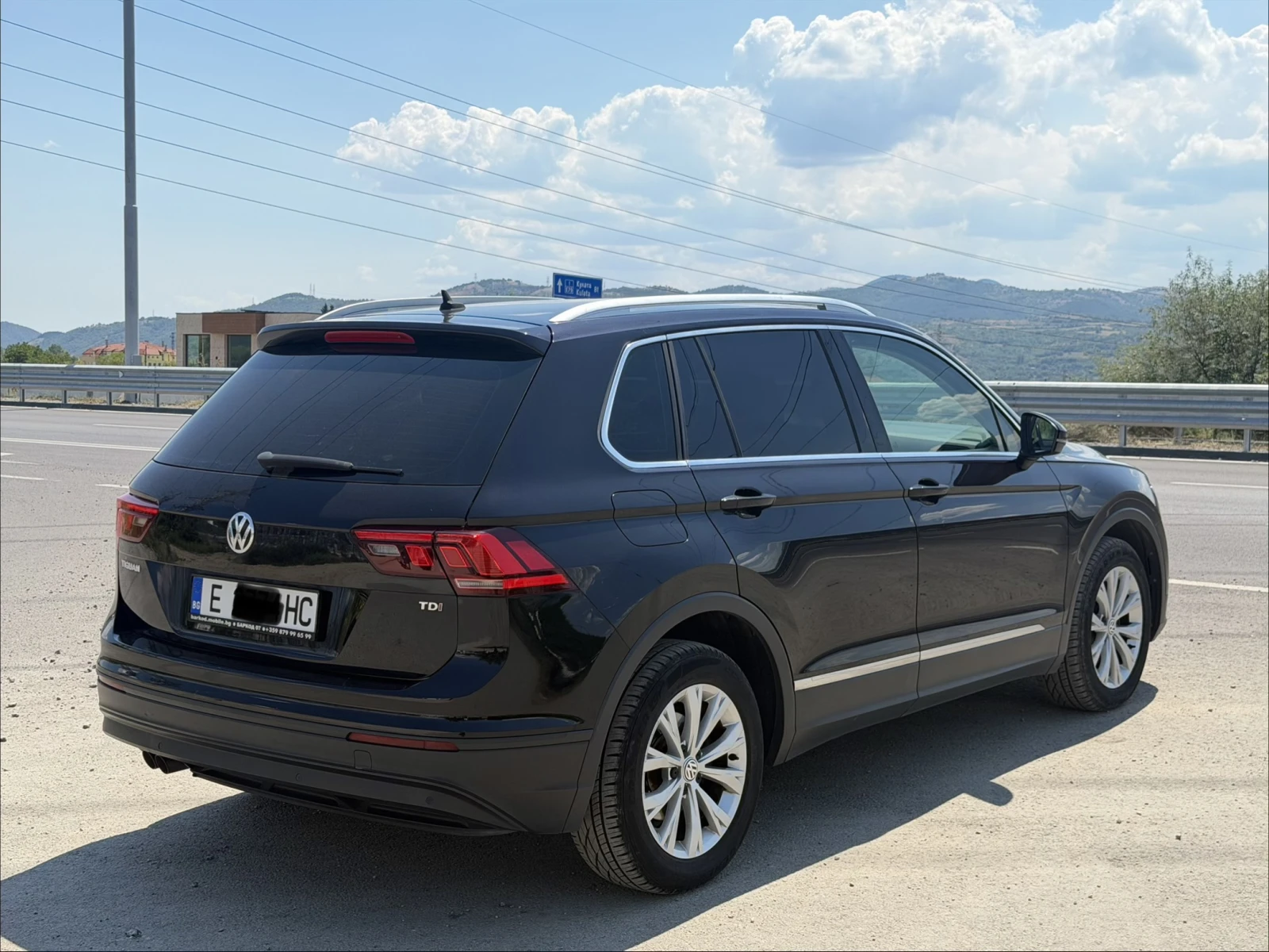 VW Tiguan 1.6 TDi, снимка 5 - Автомобили и джипове - 55554626