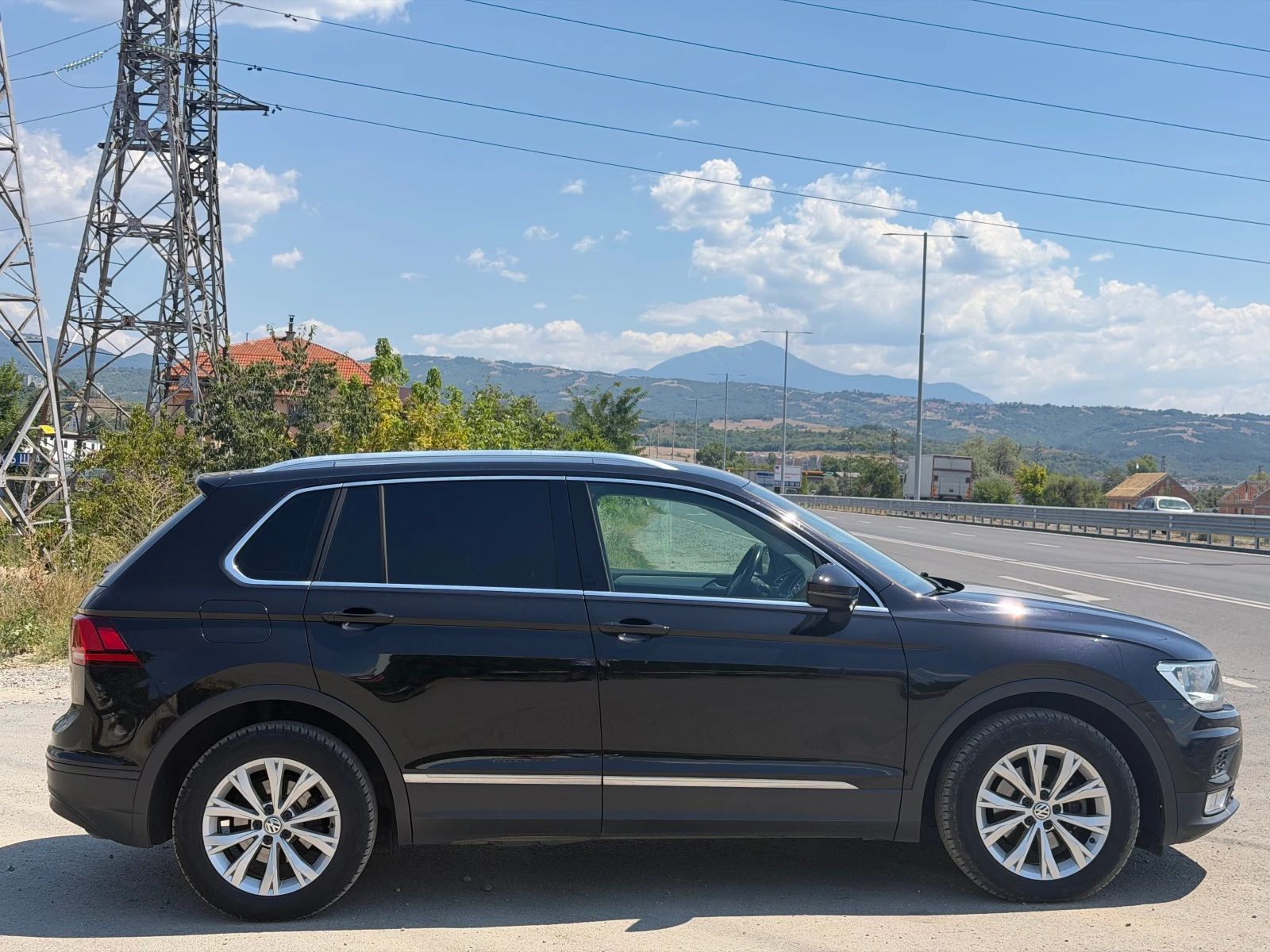 VW Tiguan 1.6 TDi, снимка 4 - Автомобили и джипове - 55554626