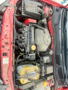 Opel Astra 1.6-75кс, снимка 12