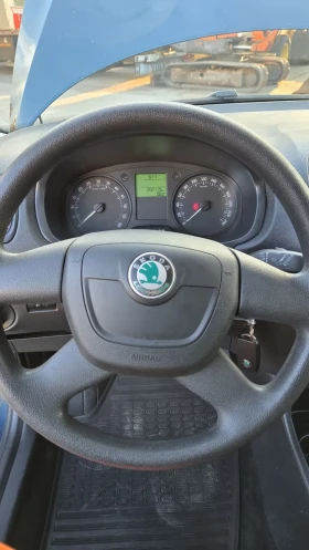 Skoda Roomster 1.6 TDI 90к.с., снимка 13