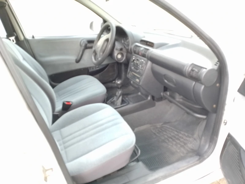 Opel Corsa, снимка 7 - Автомобили и джипове - 49519129