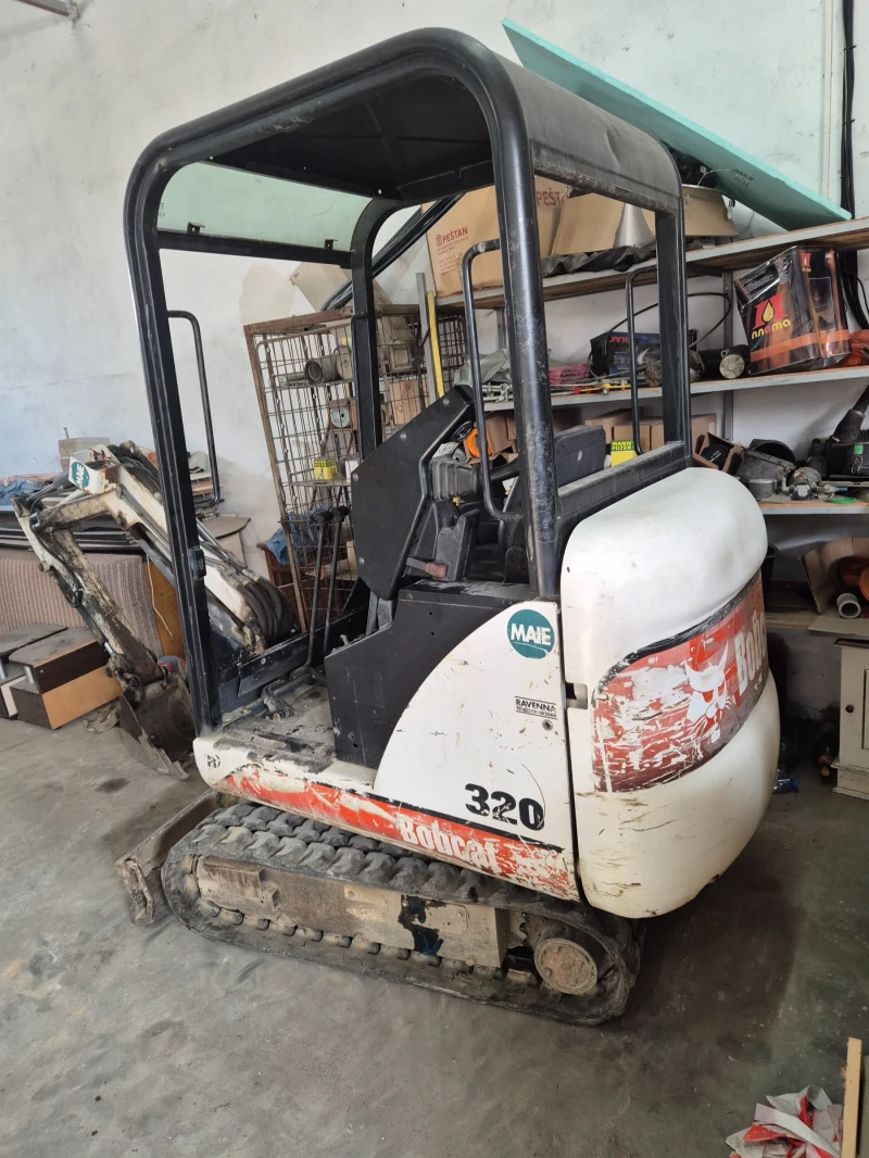 Багер Bobcat 320