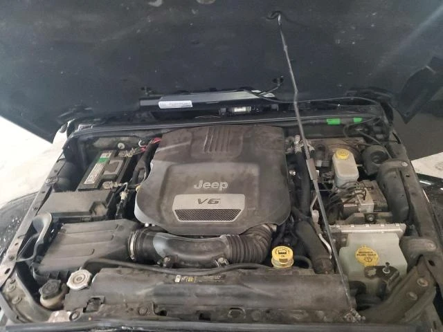 Jeep Wrangler Unlimited Sahara* Видео на мотор* CARFAX* КОжа* 4x, снимка 12 - Автомобили и джипове - 52749130