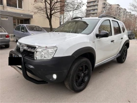 Dacia Duster 1.6i Бензин/Климатик/Мултимедия/OFF-road пакет, снимка 1