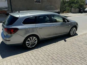 Opel Astra J Sport Tourer, снимка 1