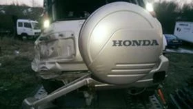     Honda Cr-v 2.0i, 147 . 