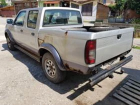 Nissan Navara 2,5 tdi-103ks - 11 лв. - 35636359 | Car24.bg