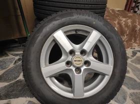 Гуми с джанти Kumho 195/65R15, снимка 1 - Гуми и джанти - 47777194