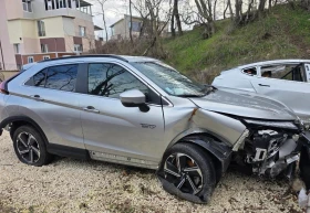 Mitsubishi Eclipse Cross PHEV Фул Екстри с Инцидент - 9999 € / 19556.34 лв. - 65624191 9