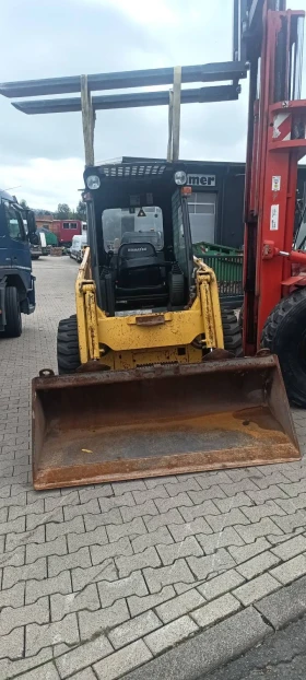 Мини челни товарачи Komatsu Sk714, снимка 10
