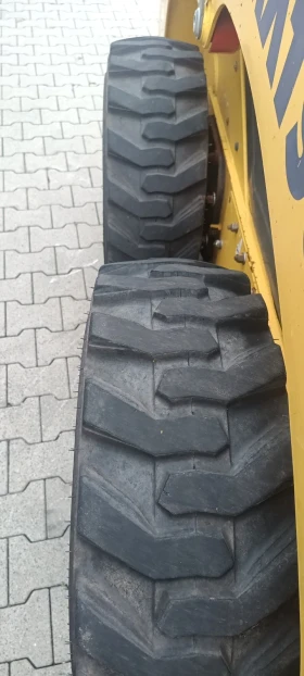 Мини челни товарачи Komatsu Sk714, снимка 5