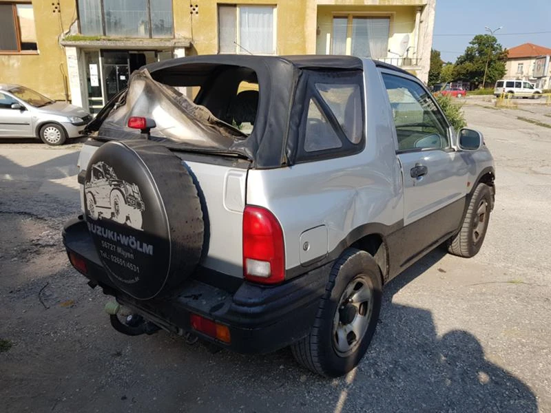 Suzuki Grand vitara 2.0i-128kc, снимка 15 - Автомобили и джипове - 49478428