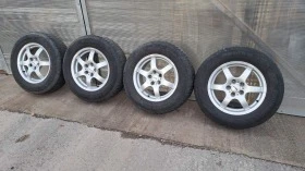 Гуми с джанти Continental 215/70R16, снимка 1 - Гуми и джанти - 45536477