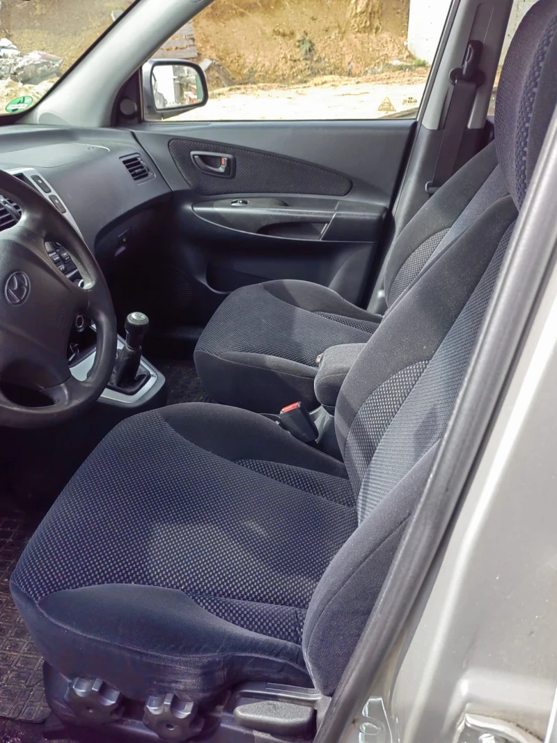 Hyundai Tucson 2.0i lpg, снимка 7 - Автомобили и джипове - 49338691