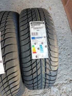 Гуми Зимни 205/60R17, снимка 2 - Гуми и джанти - 45864097