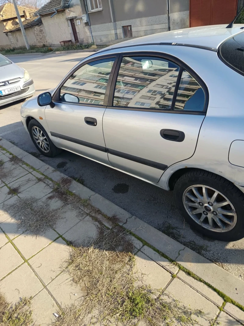 Mitsubishi Carisma 1.9, снимка 3 - Автомобили и джипове - 52892389