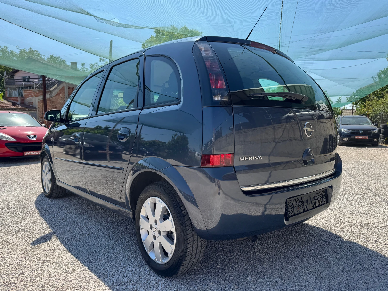 Opel Meriva 1.4i-90кс - изображение 5
