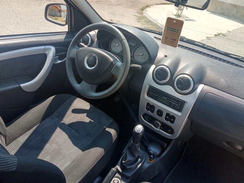 Dacia Logan 1.4 i 75ch ENERGY, снимка 13 - Автомобили и джипове - 46764441