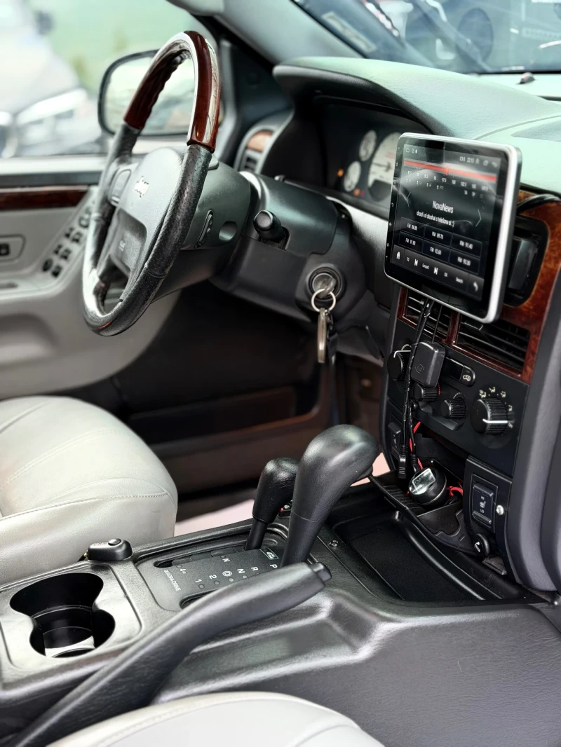 Jeep Grand cherokee 4.7HO* QUADRA DRIVE* ГАЗ* ОТЛИЧЕН* СОБСТВЕН ЛИЗИНГ, снимка 12 - Автомобили и джипове - 51396700