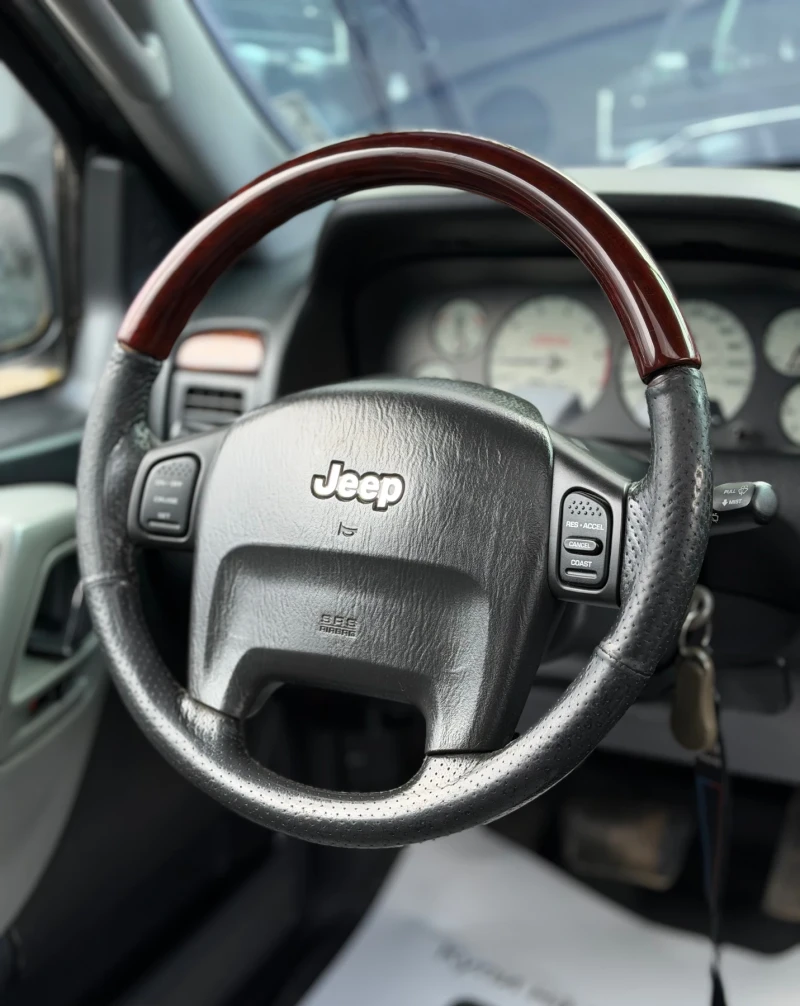 Jeep Grand cherokee 4.7HO* QUADRA DRIVE* ГАЗ* ОТЛИЧЕН* СОБСТВЕН ЛИЗИНГ, снимка 13 - Автомобили и джипове - 51396700