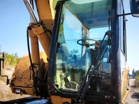 Багер Caterpillar M318C, снимка 7