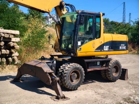 Багер Caterpillar M318C, снимка 2