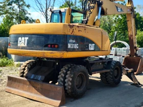 Багер Caterpillar M318C, снимка 5