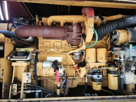 Багер Caterpillar M318C, снимка 14