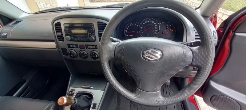 Suzuki Grand vitara 2.0i/128k.4x4, снимка 12 - Автомобили и джипове - 52343669